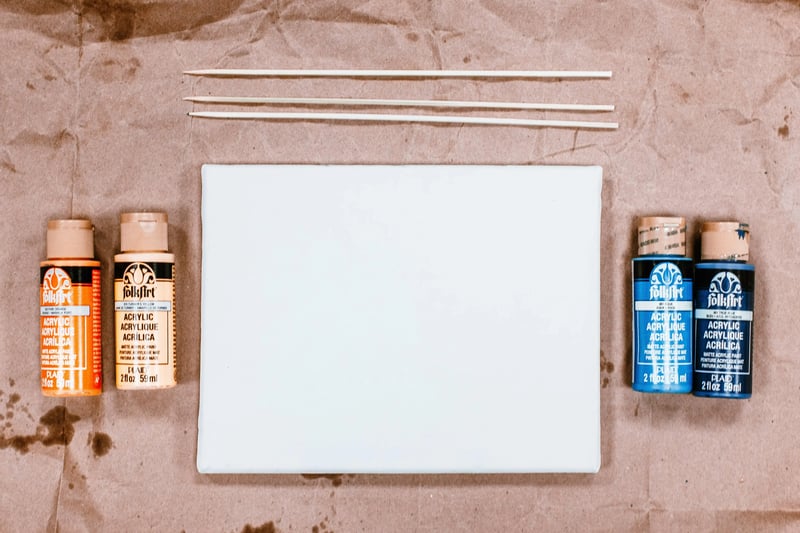 A person making a step-by-step plan on a whiteboard, showing a clear process.